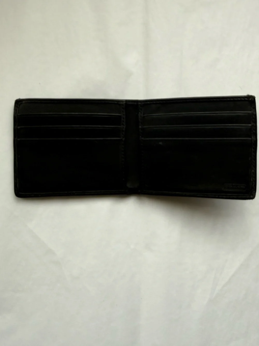 Vintage Coach Men’s Black Embossed Signature Leather Bifold Wallet